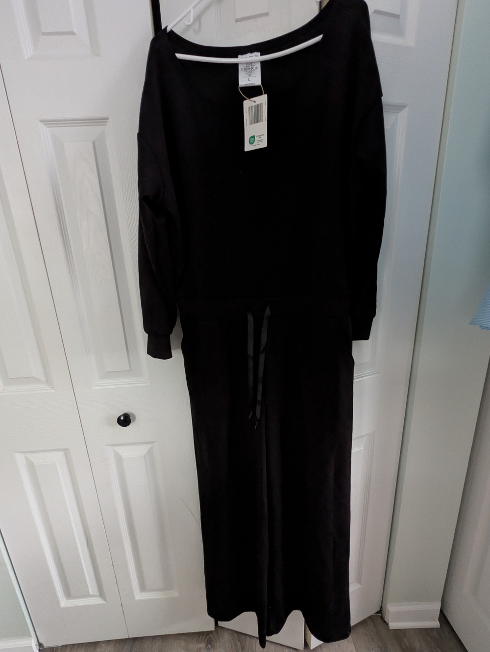 Aldi Serra Black Long Sleeve Jumpsuit with Drawstring Waist. Wide Leg romper.